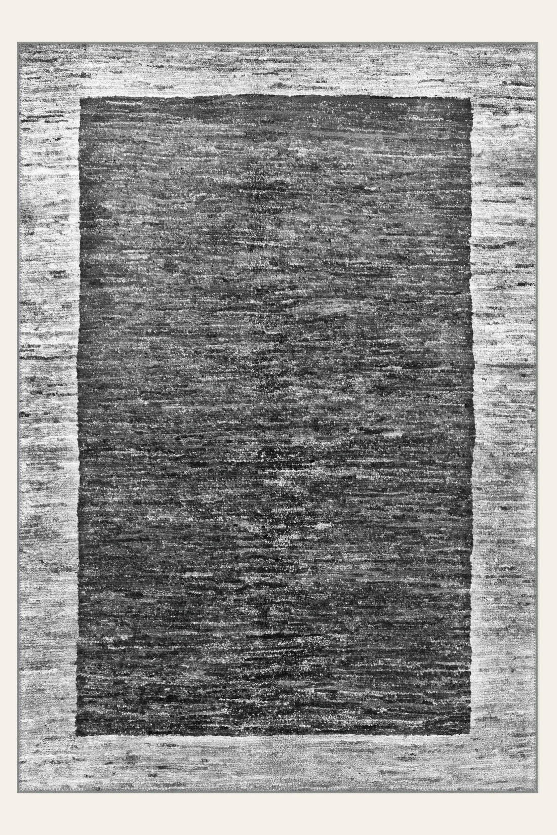 Stonewash washable rug, a quiet distressed grey ground for a working room