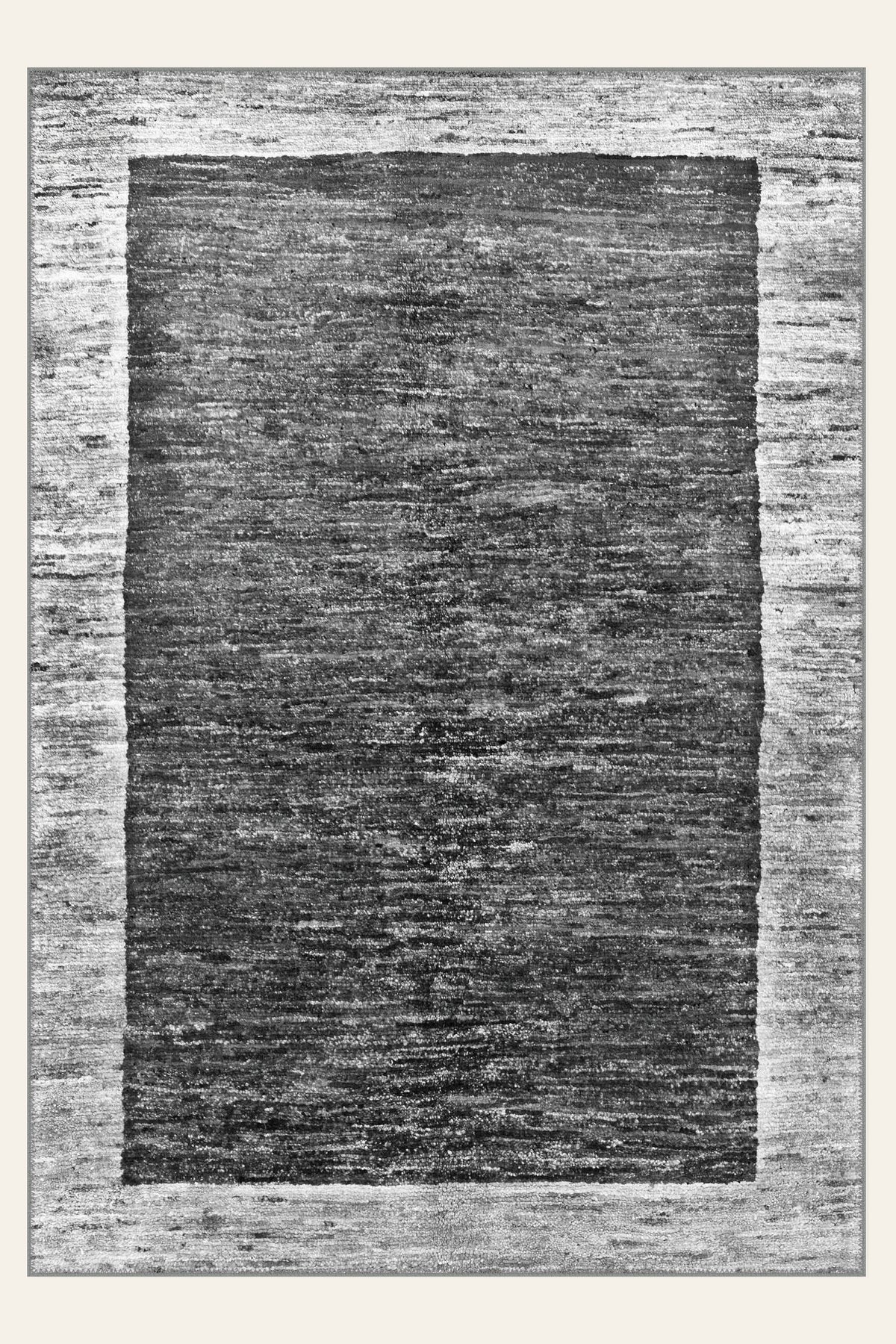 Alfombra lavable Stonewash, un fondo gris envejecido y sereno para una habitación de trabajo