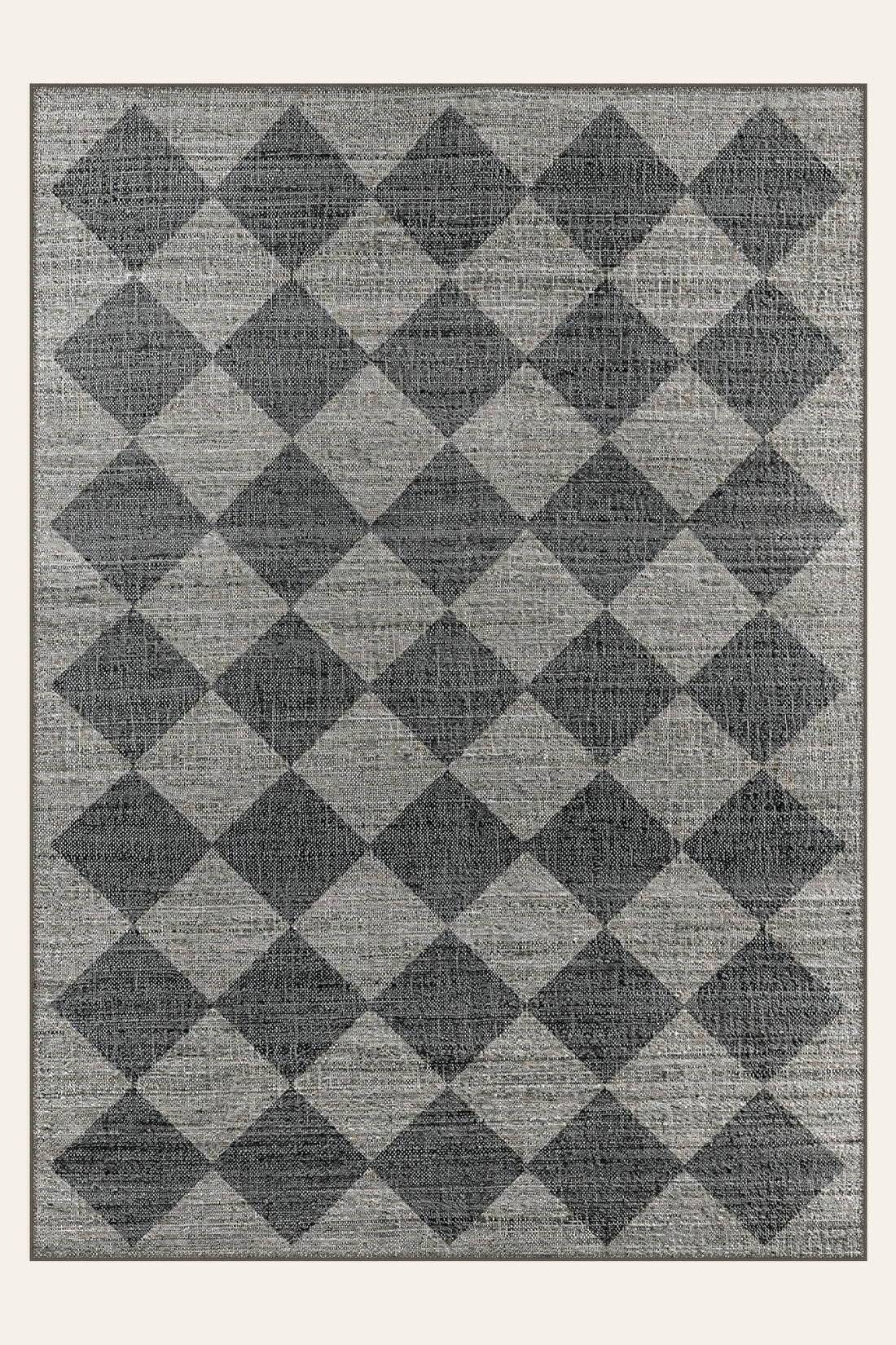 Harlequin Slate washable rug, a slate and cream diamond lattice