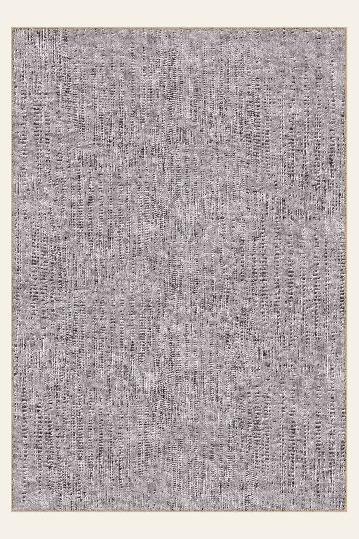 Alfombra lavable Mauve Mist, un fondo gris violáceo suave con una textura de puntada sutil