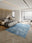 Aegean Wash Navy rectangular washable rug styled in a modern living space