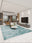 Aegean Wash Turquoise washable area rug in a styled room, rectangular, low-pile cotton blend