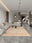 Apricot Herati washable area rug in a styled room, rectangular, low-pile cotton blend