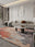 Ashfield Terracotta Multi rectangular washable rug styled in a modern living space