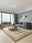 Harlequin Sand washable area rug in a styled room, rectangular, low-pile cotton blend
