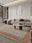 Meadow Stripe washable area rug in a styled room, rectangular, low-pile cotton blend