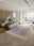 Midnight Caravan rectangular washable rug styled in a modern living space