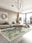 Orchid Grove washable area rug in a styled room, rectangular, low-pile cotton blend