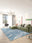 Pacific Waves washable area rug in a styled room, rectangular, low-pile cotton blend