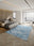 Pacific Waves rectangular washable rug styled in a modern living space