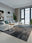 Patchwork Noir machine washable rectangular area rug with non-slip backing