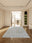 Sage Whisper rectangular washable rug styled in a modern living space