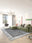 Stonewash machine washable rectangular area rug with non-slip backing
