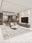 Suzani Bloom washable area rug in a styled room, rectangular, low-pile cotton blend