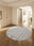 Suzani Bloom round washable area rug, machine washable low-pile cotton blend